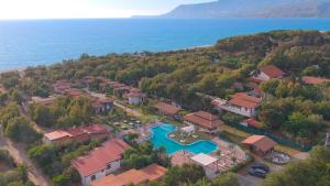 an aerial view of a resort next to the ocean at House Betania in San Ferdinando