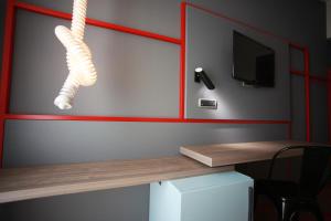 TV a/nebo společenská místnost v ubytování Hotel Corte Quadri