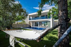 a view of the house from the backyard at Vila Marila in Stara Novalja