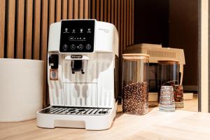 a coffee maker sitting on top of a counter at Ina Deluxe in Moisei