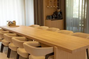 a conference room with a long table and chairs at GirSki in Bukovel +143 photos