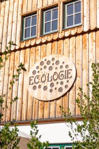 a sign on the side of a building at Ecologie Grundlsee in Grundlsee +52 photos