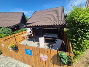 an aerial view of a house with a wooden fence at Jack House in Mostec