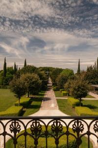 a view from a balcony of a park with a road at Relais Il Santissimo in Turi