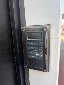 a microwave oven on the side of a wall at 1 bedroom flat in Saint Helier Jersey +4 photos