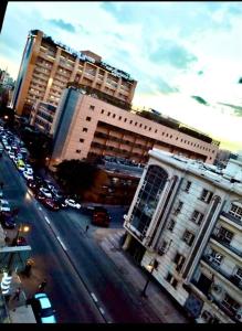 an overhead view of a city street with buildings at الشروق in Al Ḩusānīyah
