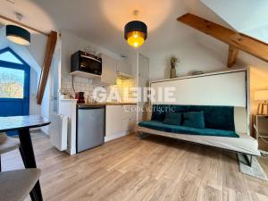 a view of a kitchen and living room of a apartment at GC - Au Gré Du Vent in Wissant