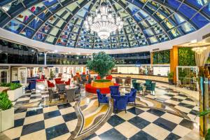 a lobby of a building with a glass domed ceiling at Side Alegria Hotel & Spa - All Inclusive-Adult Only in Side