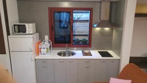 A kitchen or kitchenette at Residential Majada Apartments