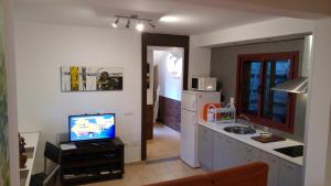A kitchen or kitchenette at Residential Majada Apartments