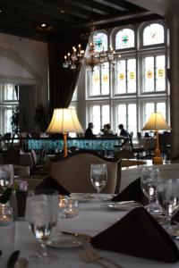 a dining room with a table with glasses on it at Columbia Club in Indianapolis