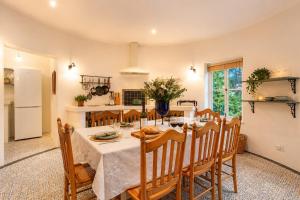 a kitchen and dining room with a table and chairs at Constantia The Silos in Sweet Valley