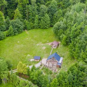 an aerial view of a house in a field at Chata na samote in Revúca