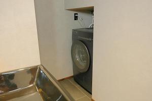 a washing machine in a room with a sink at ceueu 櫟本駅 in Tenri +16 photos