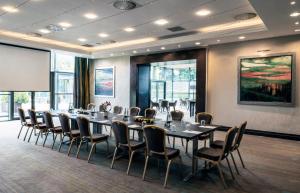 a conference room with a long table and chairs at Norton House Hotel & Spa, Edinburgh in Ingliston +43 photos