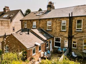 an old brick house with a pitched roof at Finest Retreats - 2 Haywood View in Grindleford Bridge