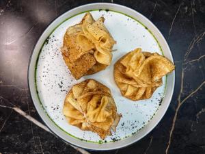 a plate of food on a table at Гостиница Балхаш in Balqash +60 photos