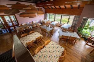 an overhead view of a restaurant with tables and chairs at Torridon Youth Hostel in Torridon