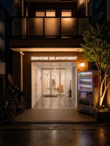 an entrance to a store with a sign that readssoftware apartment at Sidihome 365 Apartment in Osaka +4 photos