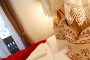 Postel nebo postele na pokoji v ubytování Hotel Gardenia