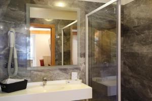 Koupelna v ubytování Hotel Gardenia
