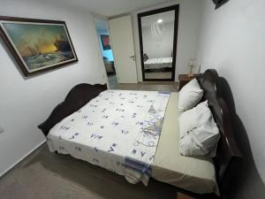 a bedroom with a bed in a room at Villa Tego in Çeşme