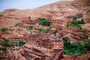 a village on the side of a mountain at Hotel restaurant ait saderat in Boumalne Dades