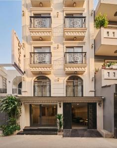 a facade of a building with balconies at Centoria Hotel By Urban B in Ho Chi Minh City