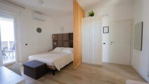 Llit o llits en una habitació de Insula Maris