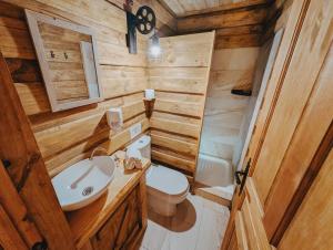 a small bathroom with a toilet and a sink at La Posada Cercedilla in Cercedilla +171 photos