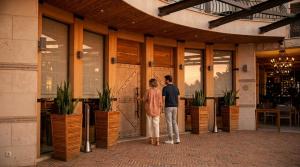a man and a woman standing in front of a door at Blu Bay Hotel Sozopol in Sozopol +138 photos