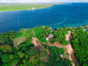 an aerial view of an island in the water at Ecokayak Beach Lodge in Zanzibar City