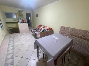 a living room with a table and a couch at Mission Holiday in Penna in Teverina