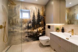 a bathroom with a shower and a toilet and a sink at D'Pazur- sauna, jacuzzi in Białka Tatrzańska +31 photos