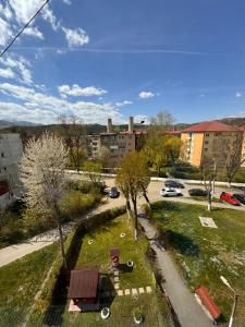 an overhead view of a park in a city at Andra apartament in Petroşani