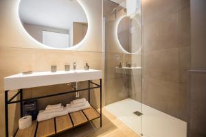 a bathroom with a sink and a mirror at VillaPignone in Genoa +76 photos