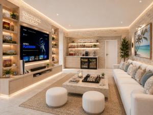 a living room with a white couch and a tv at Casa Catalina - Oceanfront house Lima in Lima