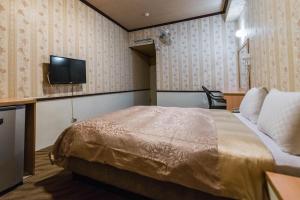 中信旅社客房内的一张或多张床位