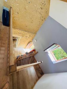 an overhead view of a staircase in a house at La Masure in Les Rameaux