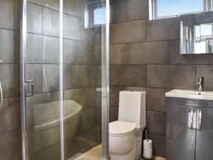 a bathroom with a shower and a toilet and a sink at The Lune - Uk47035 in Kirkby Lonsdale +15 photos