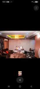 a living room with a couch and a table at Mo Exortic Royale Services in Ikorodu