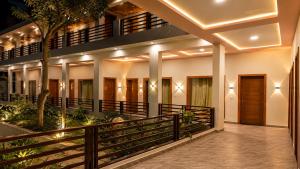an external view of a building with a walkway at Gauri Hayat Corbett Retreat in Rāmnagar