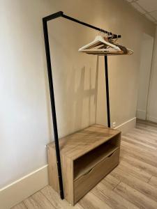 a mirror sitting on the floor in a room at Gentilly - Studio spacieux in Gentilly +2 photos