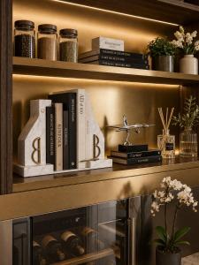 a book shelf filled with books and a bunch of books at Hôtel Beauvoisin in Paris +27 photos