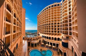 an aerial view of a hotel with two buildings at Tolip Hotel Alexandria in Alexandria