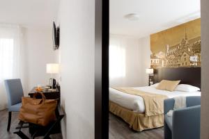 two pictures of a hotel room with a bed and a chair at Logis hôtel - La Chambre D'Amiens in Amiens