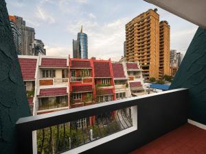 a view from the balcony of a building in a city at Beyond Stay Thong Lor 11 in Bangkok