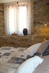 Postel nebo postele na pokoji v ubytování Hostal El Recanto