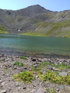 a body of water with mountains in the background at House Ali in Klyuchi