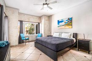 a bedroom with a bed and a ceiling fan at Ocean Dream - Kite Paradise! in Cabarete +42 photos